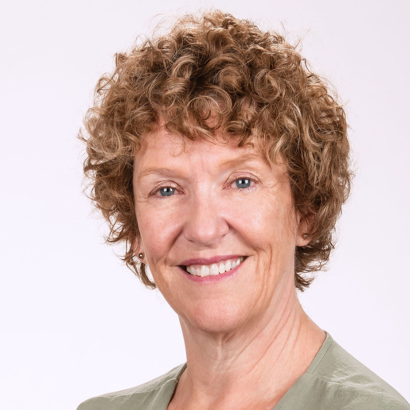 Karen Walker professional portrait with light background.