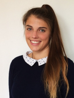 A professional portrait headshot of Berit Zuna-Pawlik wearing a black sweater.