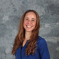 Juliëtte Kamphuis Portrait Professional Portrait of Juliëtte Kamphuis smiling against a neutral background.