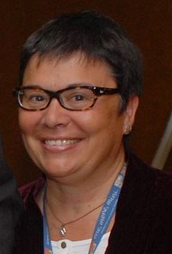 Portrait of Carmen Pallás Alonso smiling.