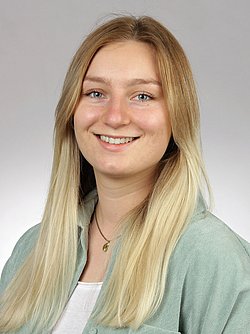 Portrait of Johanna Priller smiling.