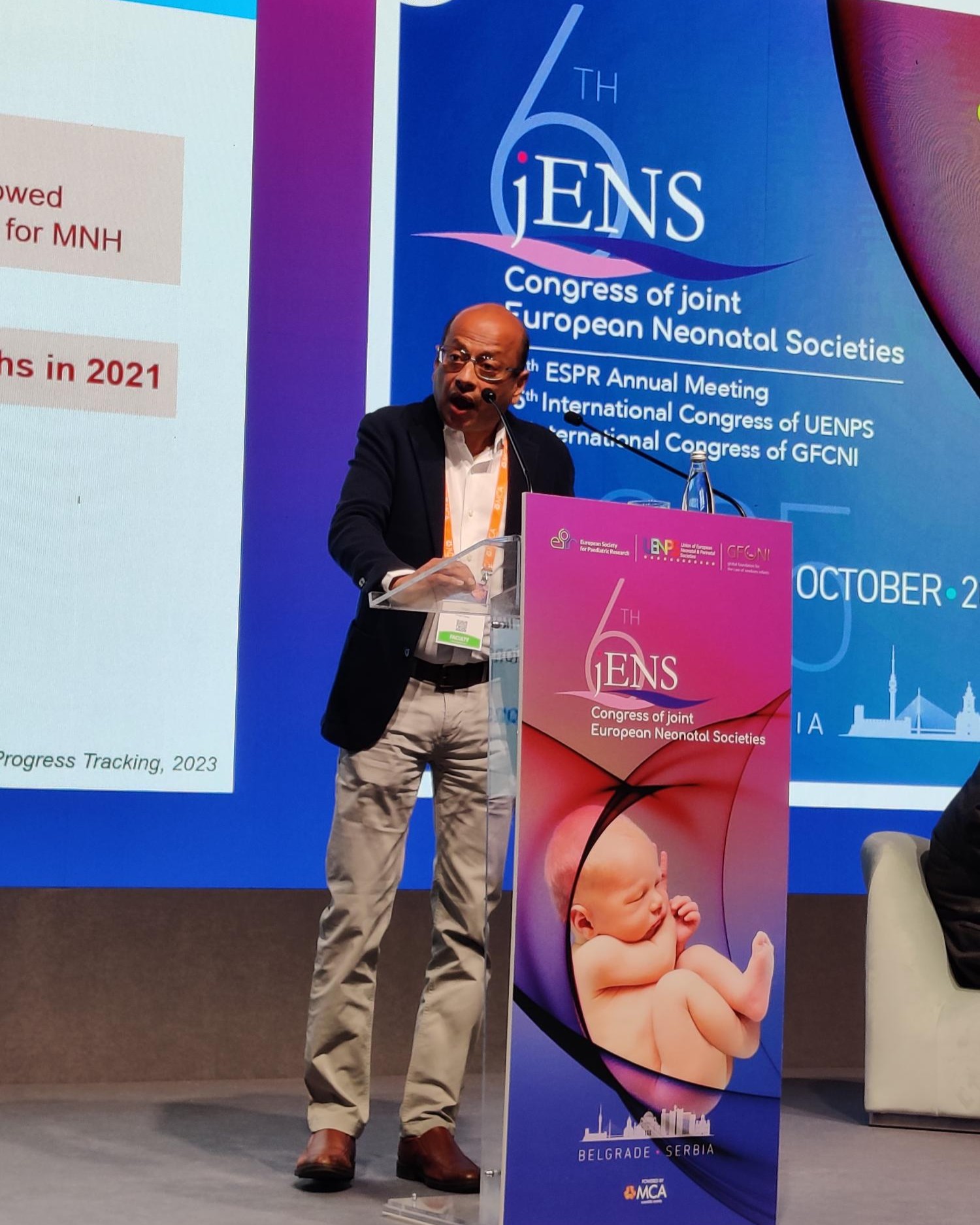 Gagan Gupta presenting on stage at jENS 2025 neonatal congress in Belgrade, Serbia