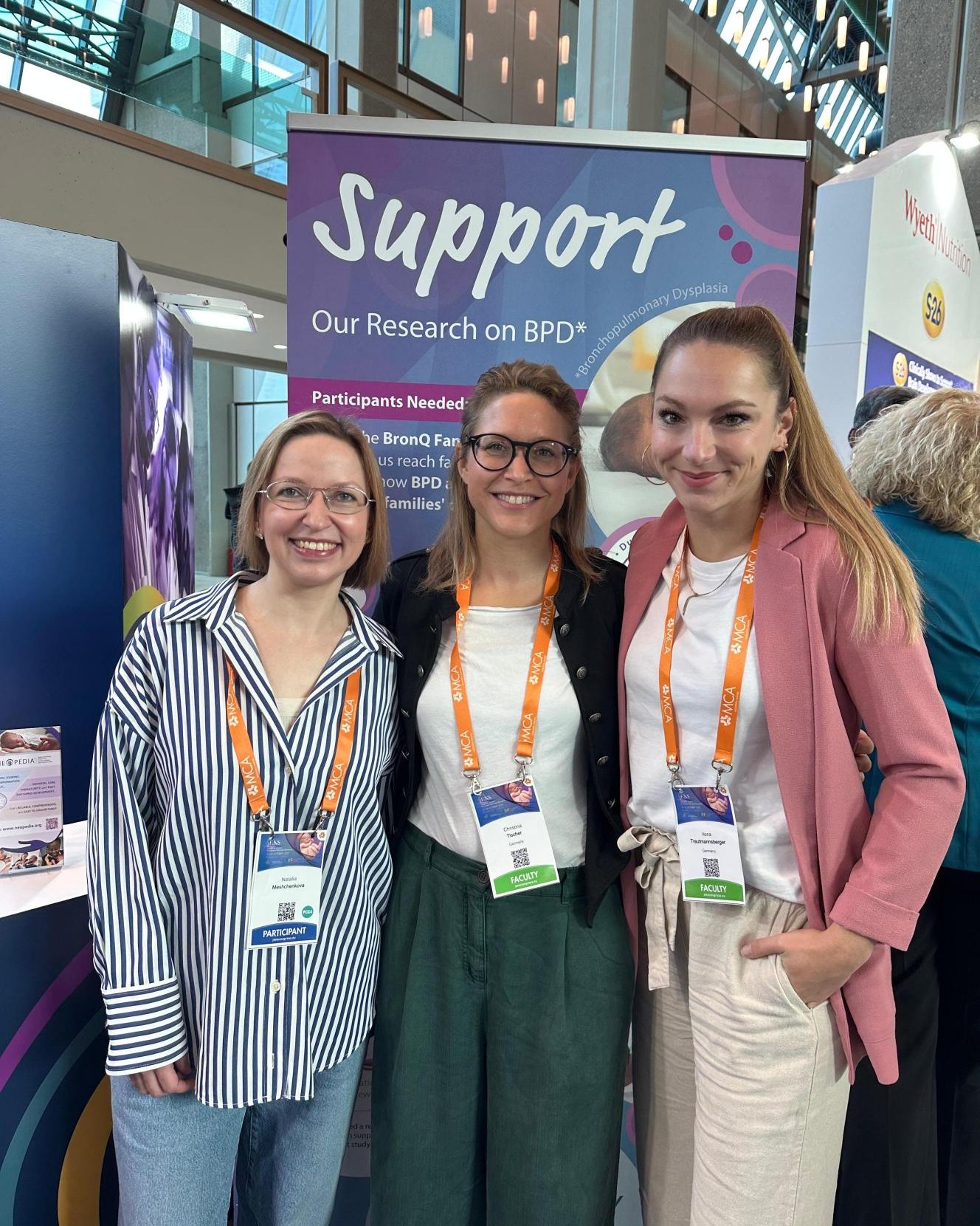 Group photo of participants from GFCNI and Chiesi in front of the BronQ Family banner at jENS 2025 neonatal congress in Belgrade, Serbia