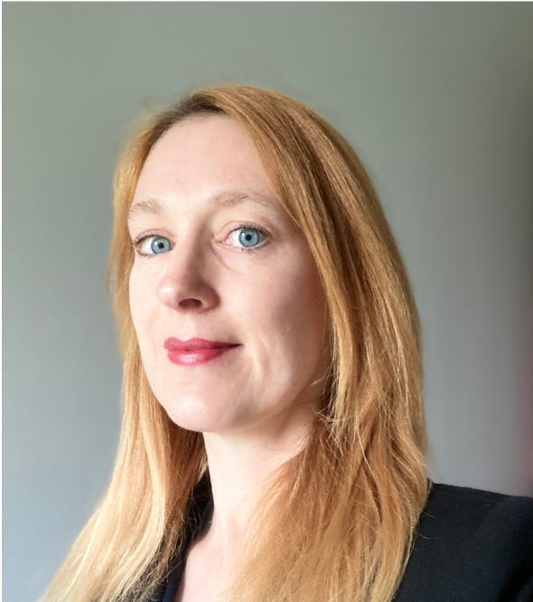 A professional headshot of Teresa Primavesi-Poggio with a confident look.