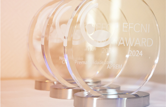 Close-up of the EFCNI Award trophies, marking achievements in newborn healthcare.