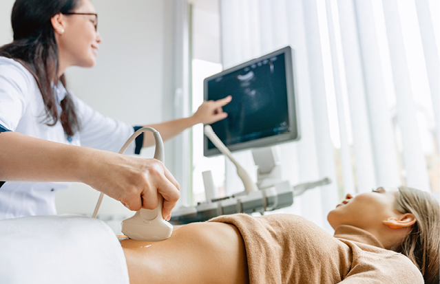 Close-up of an ultrasound examination during a preconception health appointment.