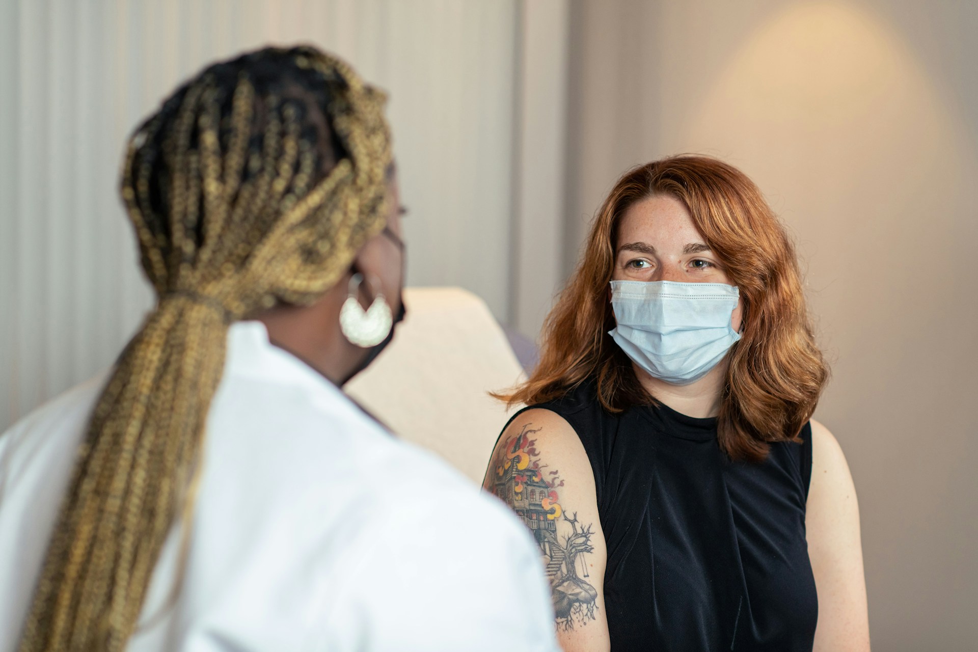 Preconception care consultation with a healthcare professional Healthcare professional speaking with a patient during a preconception care consultation.